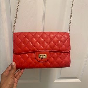 Vibrant quilted turn lock clutch